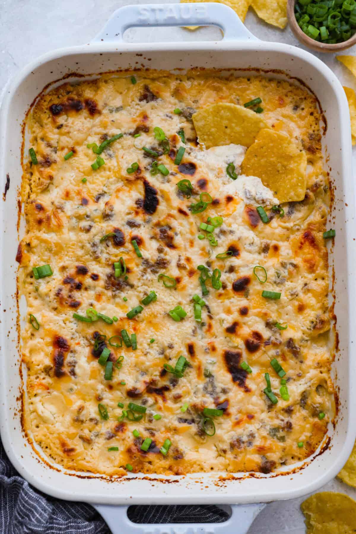 Top down shot of hissy fit dip  garnished with green onions. 