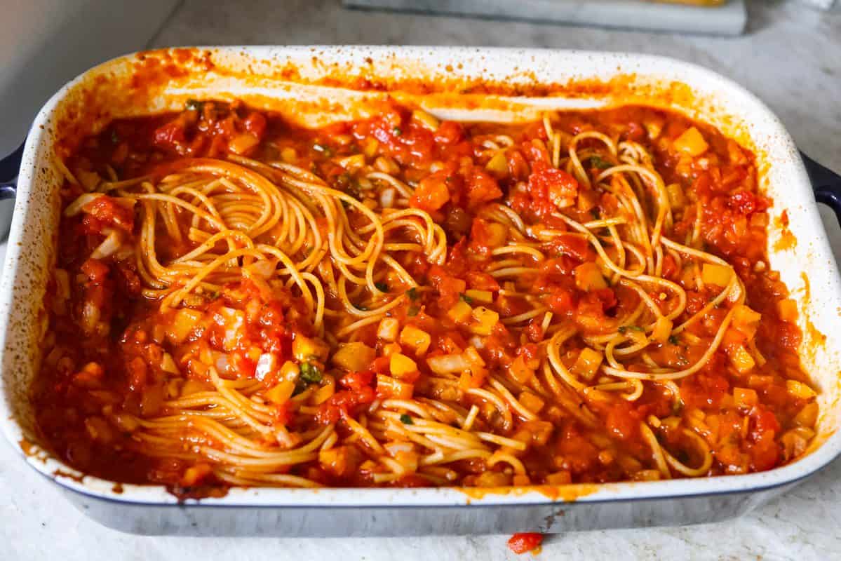 Baked spaghetti stirred together. 