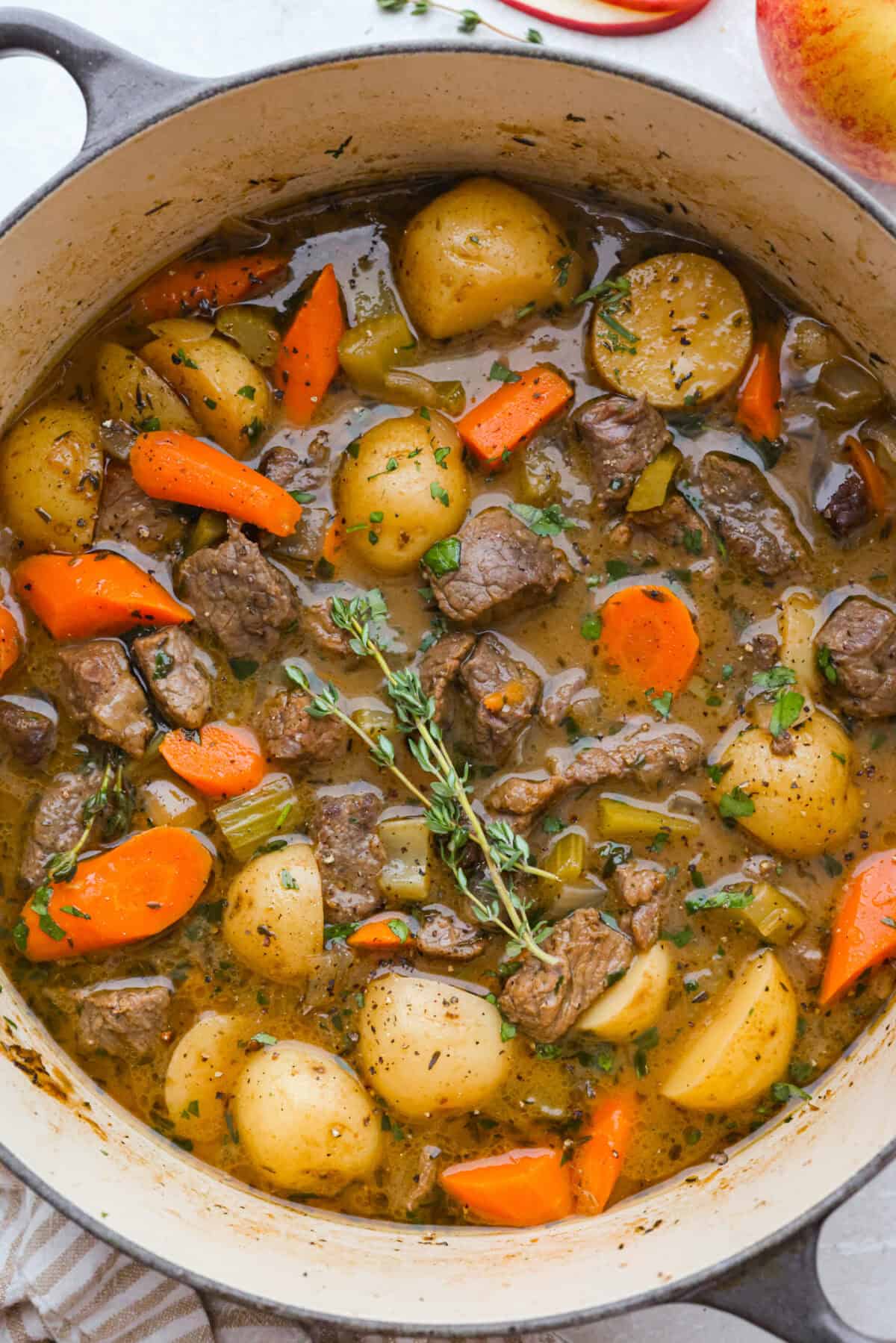 Top down shot of cooked apple cider beef stew. 