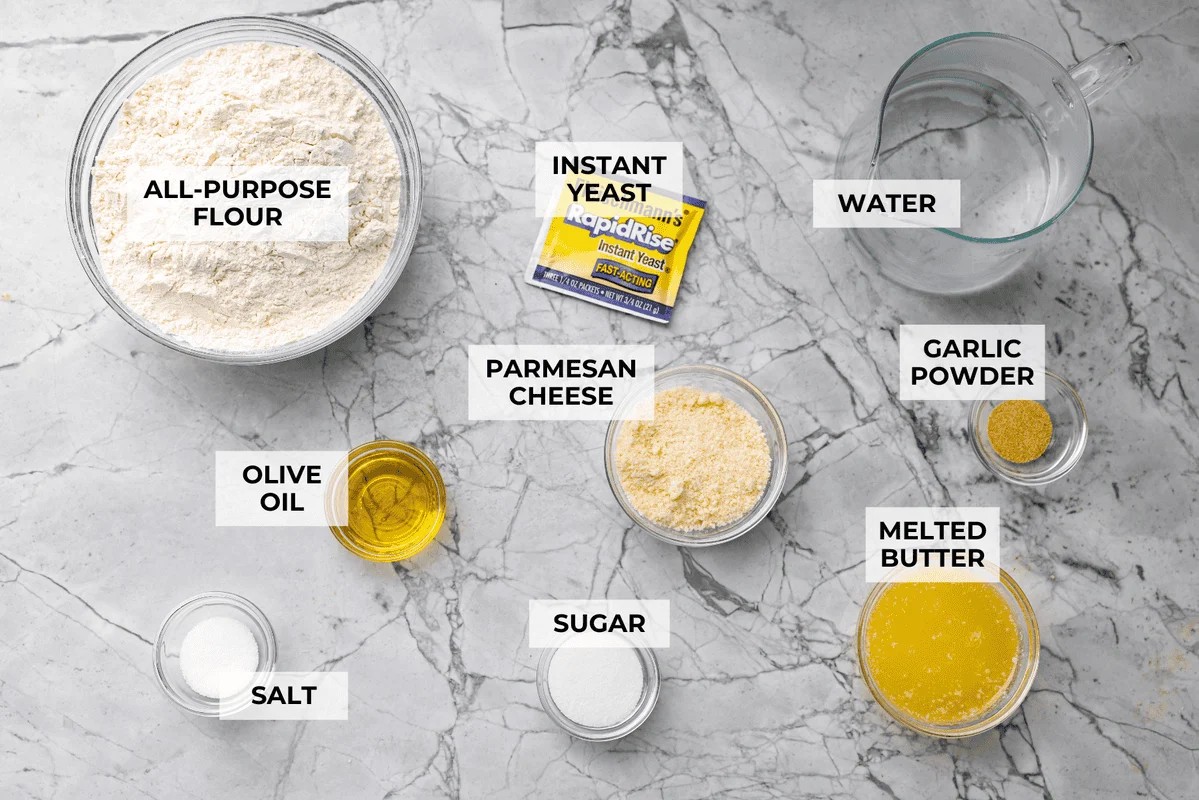 Overhead shot of labeled Little Caesars crazy bread ingredients. 