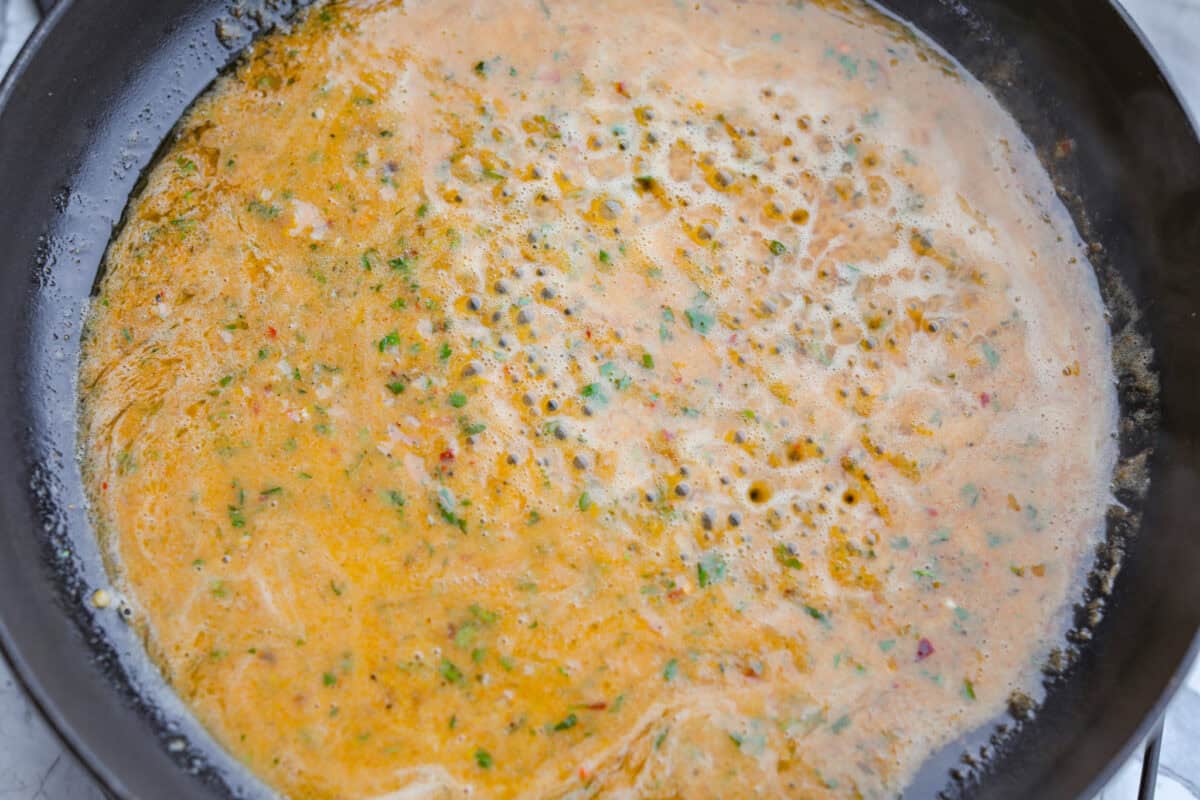 Cowboy butter metled in a skillet. 